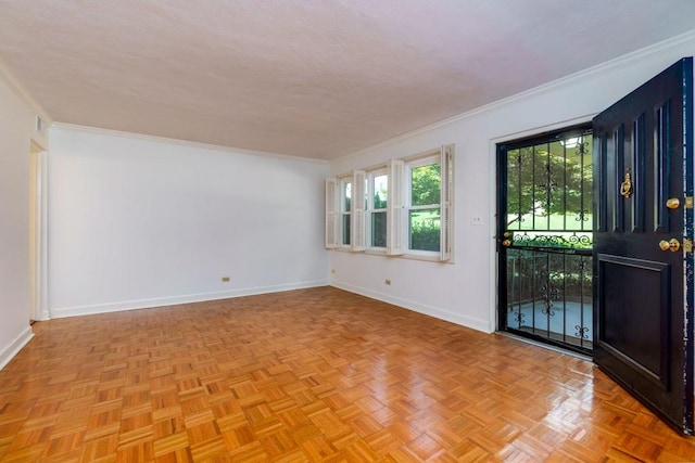 unfurnished room with light parquet floors and crown molding