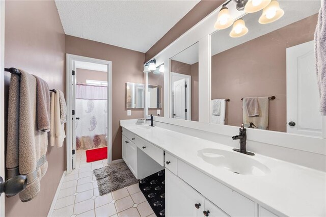 full bathroom with a shower with curtain, double vanity, and a sink