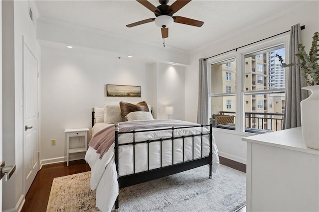 1101 Juniper St NE Unit 1012, Atlanta, GA 30309 - bedroom featuring ornamental molding, wood finished floors, baseboards, and a ceiling fan