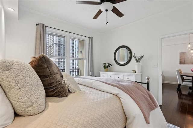 1101 Juniper St NE Unit 1012, Atlanta, GA 30309 - bedroom with hardwood / wood-style floors, ornamental molding, baseboards, and ceiling fan