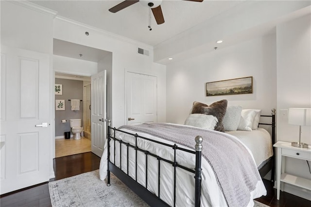 1101 Juniper St NE Unit 1012, Atlanta, GA 30309 - bedroom featuring crown molding, dark wood finished floors, baseboards, and a ceiling fan