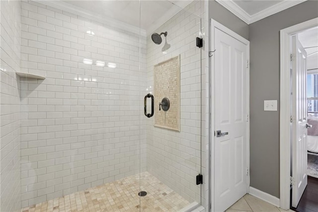 1101 Juniper St NE Unit 1012, Atlanta, GA 30309 - full bathroom with crown molding, a stall shower, baseboards, and tile patterned flooring