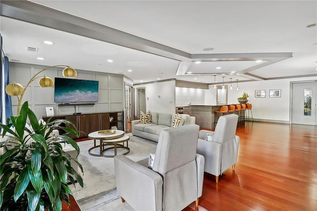 1101 Juniper St NE Unit 1012, Atlanta, GA 30309 - living room featuring wood finished floors and recessed lighting