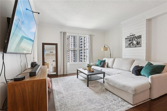 1101 Juniper St NE Unit 1012, Atlanta, GA 30309 - living room with crown molding, a textured ceiling, and wood finished floors