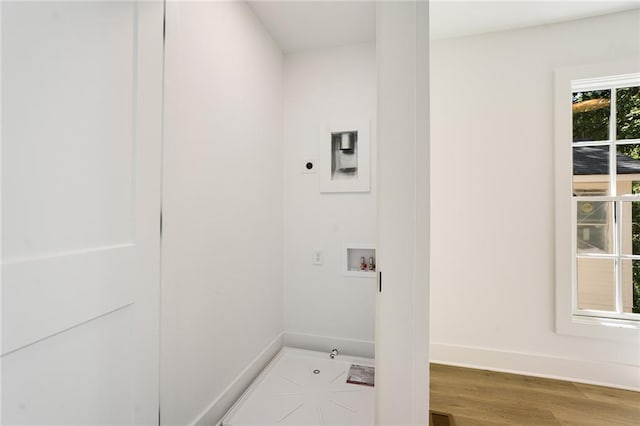 laundry room featuring hookup for an electric dryer, washer hookup, and hardwood / wood-style flooring