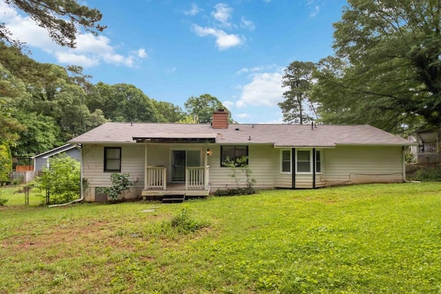 1353 Litchfield Ct, Snellville, GA 30078 - back of house featuring a chimney