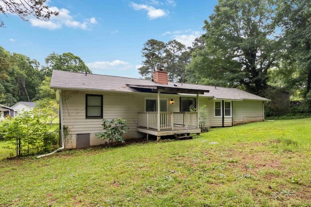 1353 Litchfield Ct, Snellville, GA 30078 - back of house with a chimney and a wooden deck
