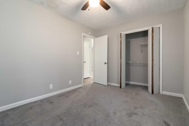 1353 Litchfield Ct, Snellville, GA 30078 - unfurnished bedroom with carpet flooring, baseboards, a ceiling fan, and a closet