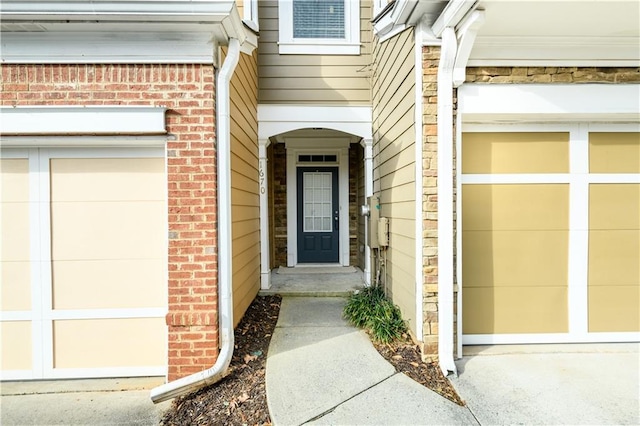 property entrance with a garage