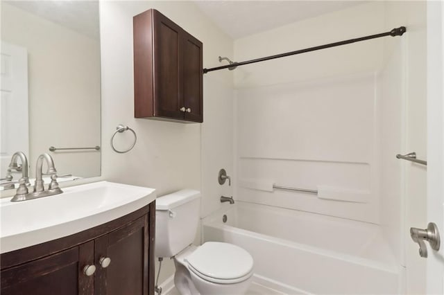 bathroom featuring vanity, toilet, and shower / bathtub combination