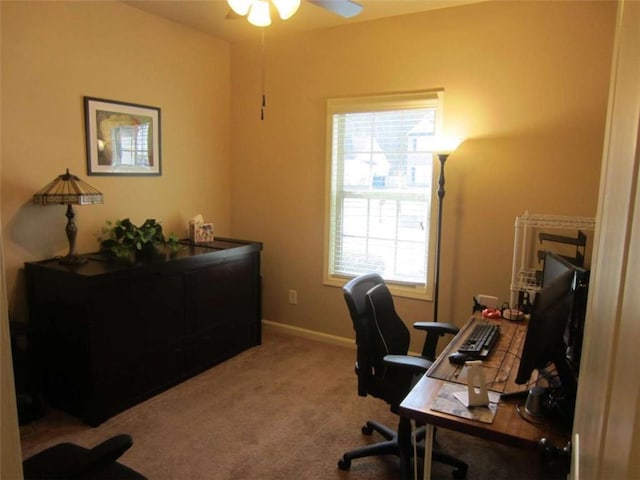 office with carpet flooring, a ceiling fan, and baseboards