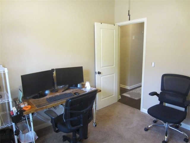 office area with baseboards and carpet floors