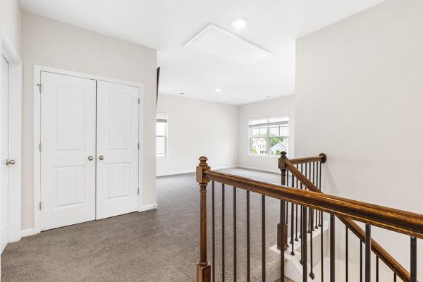 1494 Weeping Tree Cir, Auburn, GA 30548 - hallway with an upstairs landing, carpet, attic access, and recessed lighting