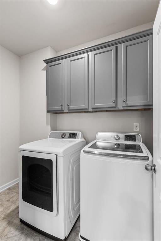 1494 Weeping Tree Cir, Auburn, GA 30548 - washroom featuring separate washer and dryer and cabinet space