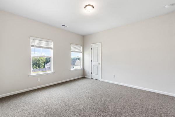 1494 Weeping Tree Cir, Auburn, GA 30548 - carpeted spare room featuring baseboards