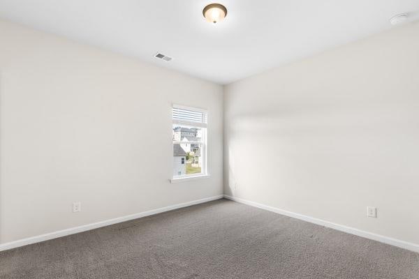 1494 Weeping Tree Cir, Auburn, GA 30548 - carpeted empty room featuring baseboards