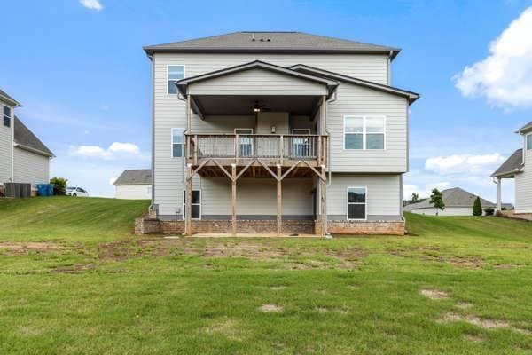 1494 Weeping Tree Cir, Auburn, GA 30548 - rear view of house with a lawn