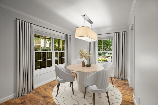 1384 N Crossing Dr NE, Atlanta, GA 30329 - dining space featuring crown molding and wood finished floors