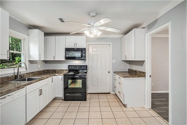 725 Bearmeat Spur, Hiawassee, GA 30546 - kitchen featuring crown molding, dark countertops, a sink, white cabinetry, and black appliances