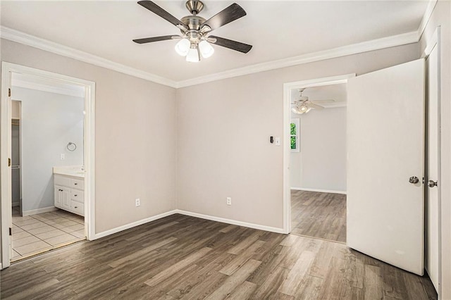 725 Bearmeat Spur, Hiawassee, GA 30546 - unfurnished bedroom featuring baseboards, wood finished floors, a spacious closet, ornamental molding, and a closet