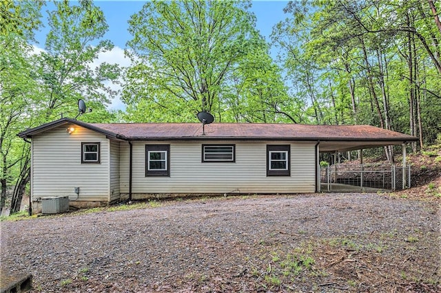 725 Bearmeat Spur, Hiawassee, GA 30546 - back of house with cooling unit and a carport