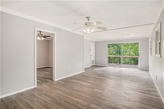725 Bearmeat Spur, Hiawassee, GA 30546 - unfurnished room with crown molding, a ceiling fan, and wood finished floors