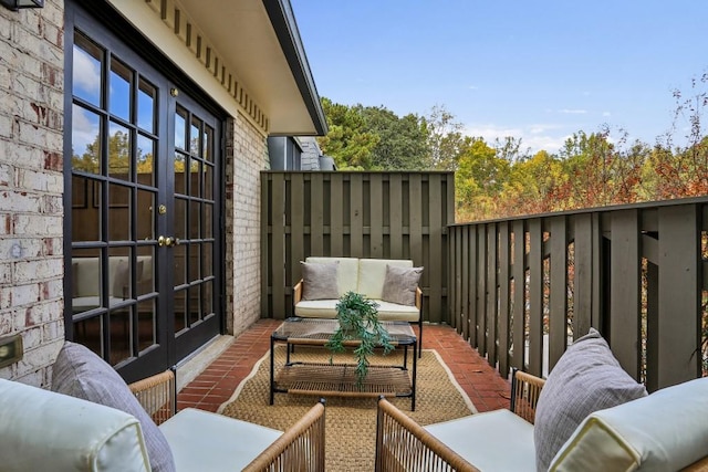 balcony with a patio and french doors