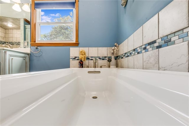 full bath featuring a washtub