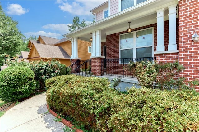 doorway to property featuring a porch