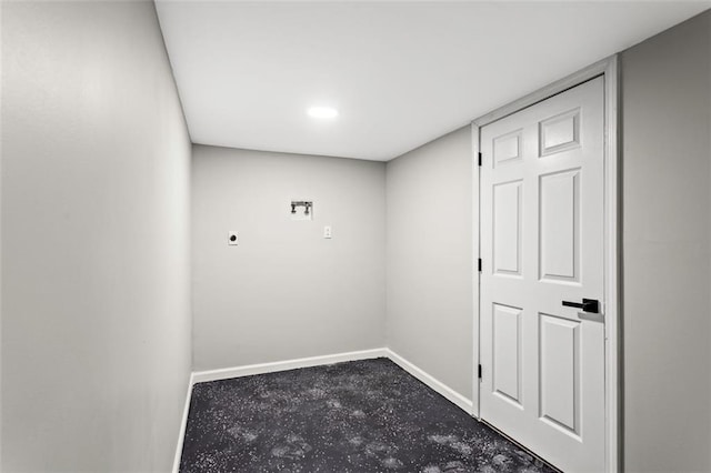 clothes washing area with baseboards and hookup for an electric dryer