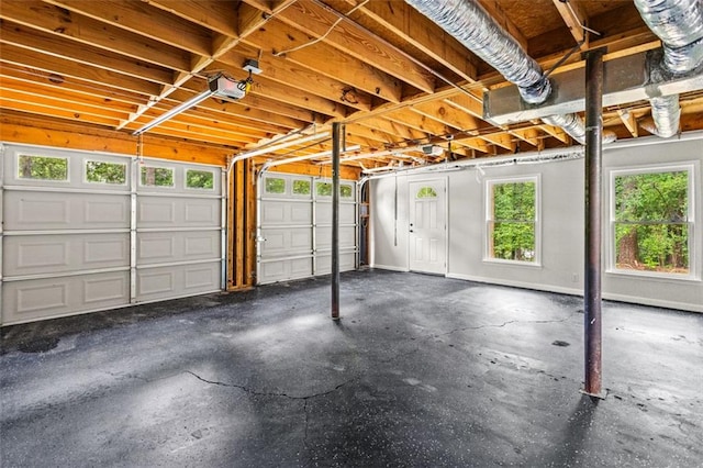 garage featuring a garage door opener