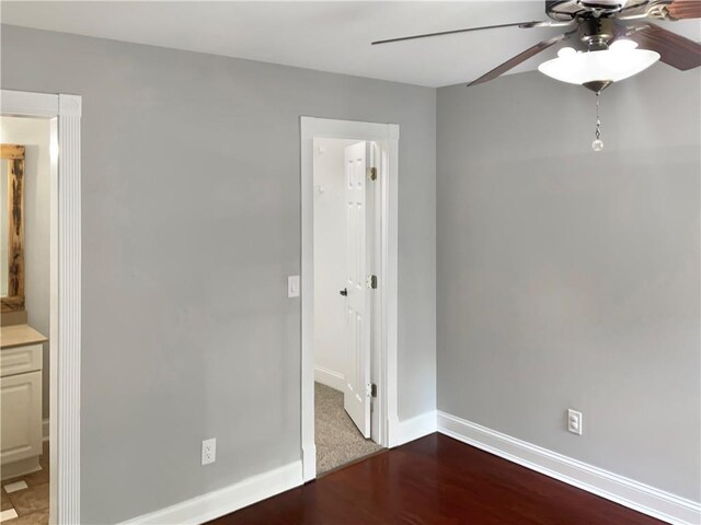 spare room with ceiling fan and carpet floors