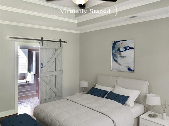 tiled bedroom with crown molding and a barn door