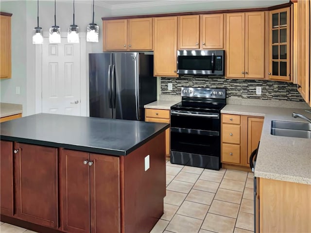 kitchen featuring light tile patterned flooring, stainless steel appliances, sink, and tasteful backsplash