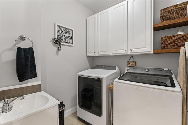 3560 Greenside Ct, Dacula, GA 30019 - laundry room with separate washer and dryer and cabinet space