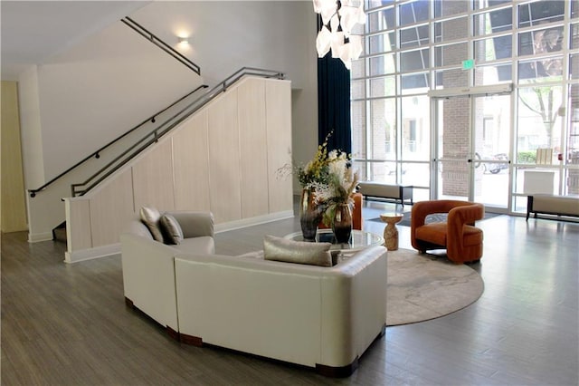 711 Cosmopolitan Dr Unit 413, Atlanta, GA 30324 - building lobby featuring expansive windows, stairs, and a towering ceiling