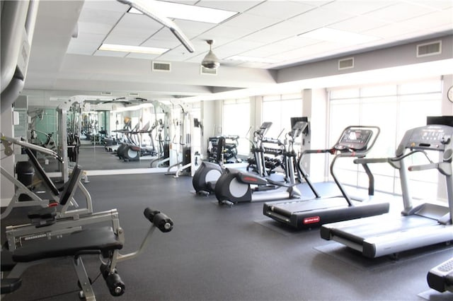 711 Cosmopolitan Dr Unit 413, Atlanta, GA 30324 - exercise room featuring a drop ceiling