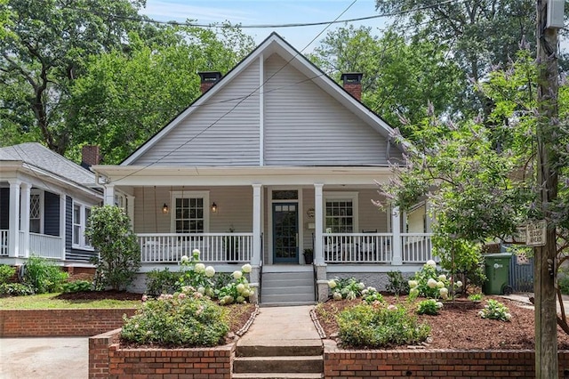343 Josephine St NE, Atlanta, GA 30307 - bungalow-style home with a chimney and a porch