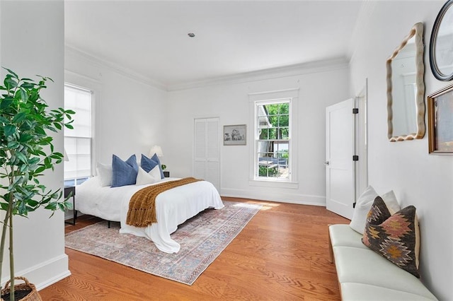 343 Josephine St NE, Atlanta, GA 30307 - bedroom featuring light wood finished floors and crown molding