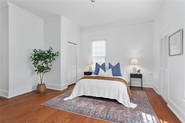 343 Josephine St NE, Atlanta, GA 30307 - bedroom with wood finished floors and crown molding