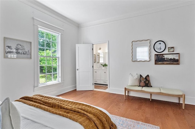 343 Josephine St NE, Atlanta, GA 30307 - bedroom featuring wood finished floors, ornamental molding, and ensuite bathroom