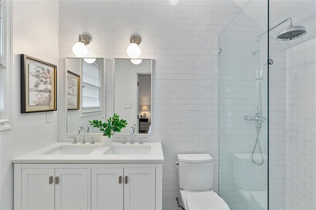 343 Josephine St NE, Atlanta, GA 30307 - bathroom featuring tiled shower and double vanity