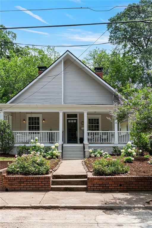 343 Josephine St NE, Atlanta, GA 30307 - view of front of house featuring a chimney and a porch