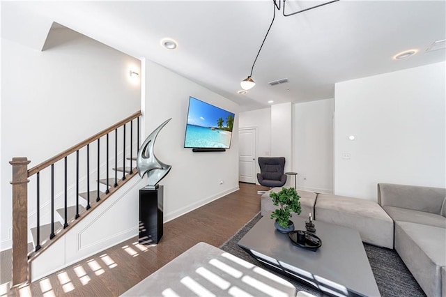 living room featuring dark hardwood / wood-style floors