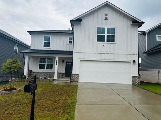 view of front facade with a front lawn and a garage