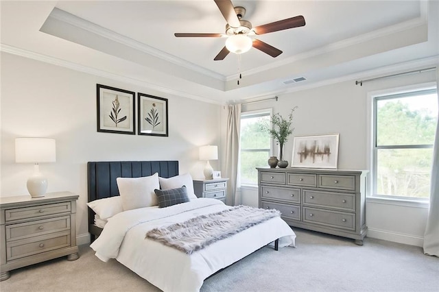 541 Fundao Ln, Lawrenceville, GA 30046 - bedroom featuring a raised ceiling, light colored carpet, ornamental molding, multiple windows, and ceiling fan