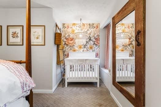 bedroom with an inviting chandelier