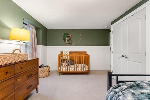 carpeted bedroom featuring a closet