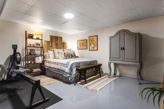 bedroom with concrete floors