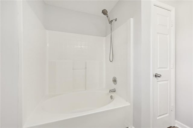 full bath featuring tub / shower combination